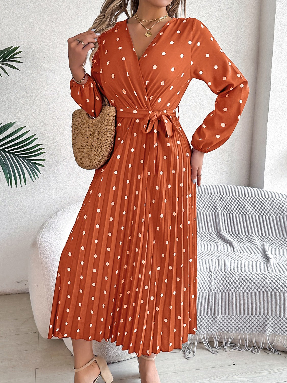 PERLA | Gestrikte polka dot midi-jurk met lange mouwen